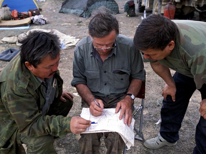 Rangers Examine a Map